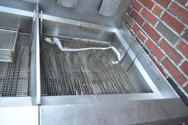 Giles EOF-24 stainless steel commercial 3-bay deep fat fryer with dumping station. 480V, 3-phase, on casters.