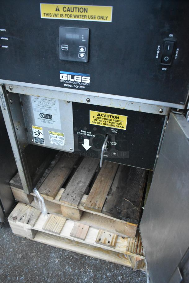 Giles EOF-24 stainless steel 3-bay commercial electric fryer with dumping station, caution labels, on casters, 480V, 3-phase.