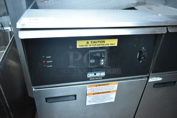 Giles EOF-24 stainless steel 3-bay deep fat fryer with dumping station. Features control panel, caution labels. 480V, 3 phase.