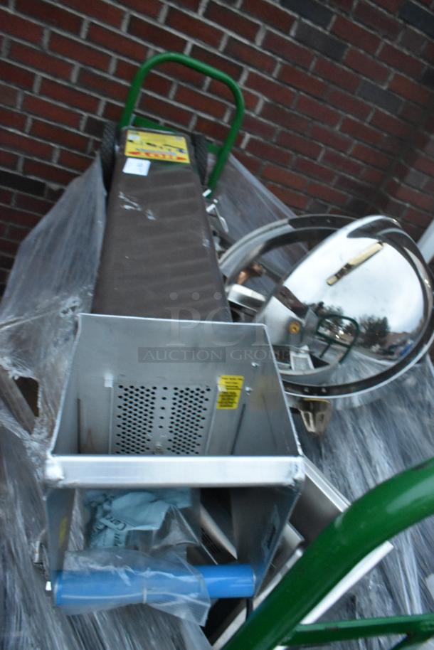 Metal green U Boat with shortening shuttle and chafer; sturdy construction, suitable for transport and storage.