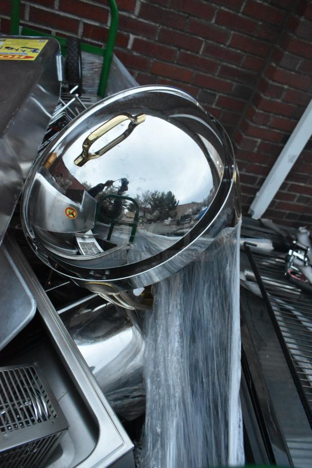 Metal green U Boat with contents including a shortening shuttle and chafer, slightly used, with visible wear marks.