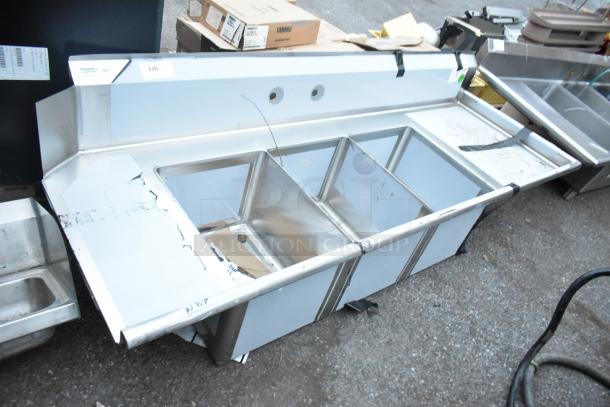 Brand new Regency 600DDTS384RT 7' three-compartment sink with right drainboard, 16-gauge stainless, no legs, scratch and dent.
