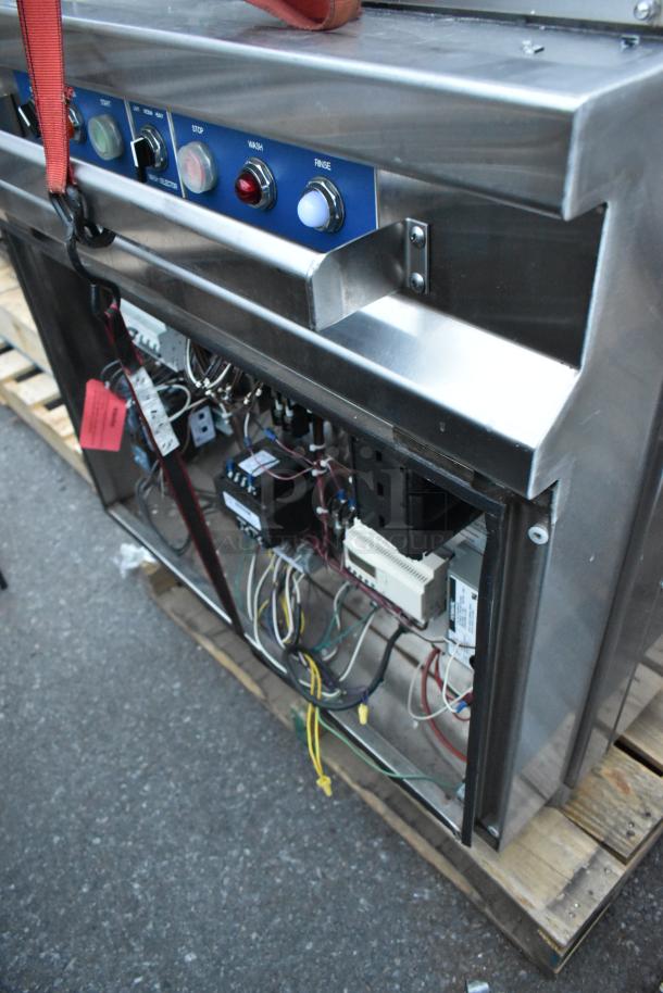 LVO FL14G stainless steel pot and pan washer with electrical panel visible. 460 volts, 3 phase. Excellent condition.