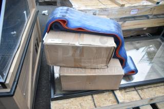 2 new 8"x.072"x150" units, scratch and dent, partially unrolled, packed in cardboard boxes; auction item 191.