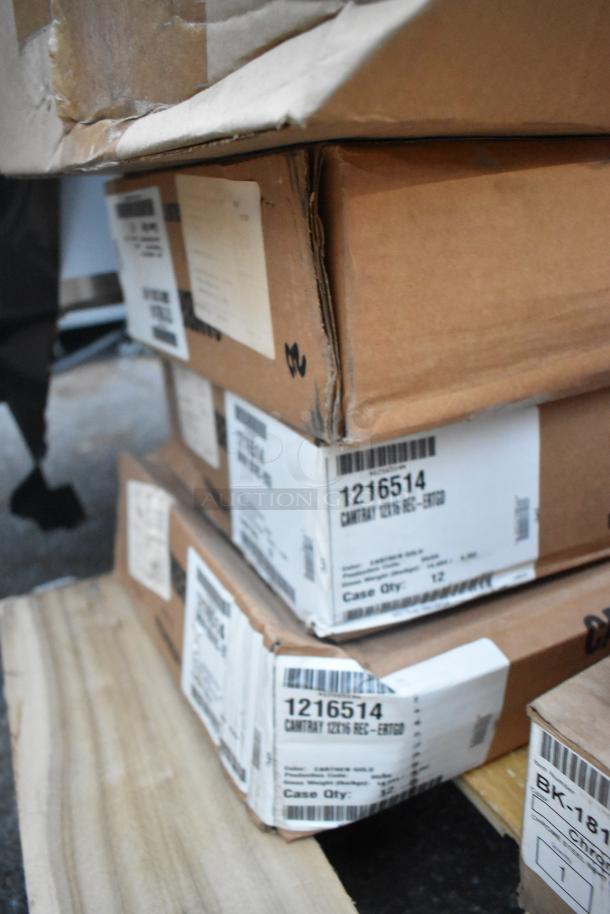 Stacked boxes of Cambro 1216514 fiberglass Camtrays, 12"x16", earthen gold color, showing shipping labels, minor box wear.