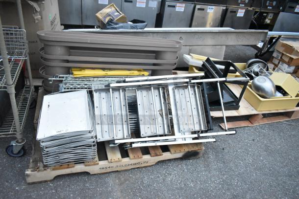 Three pallets of mixed items, including a ladder, mop bucket, metal baking pans, yellow bins, and shelving. Various conditions.