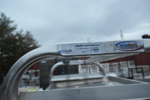 Winholt metal pan transport rack with commercial casters, visible brand label, showing model AL-1820B-13D-2LC-SBKT.