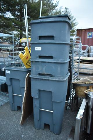Four large gray poly trash cans stacked; visible label reads "201." Durable and robust design, ideal for heavy-duty use.