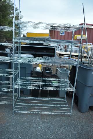 Chrome finish 5-tier wire shelving unit, dismantling required, sturdy construction, suitable for storage.