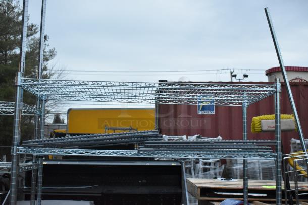 Chrome finish 5-tier wire shelving unit, disassembled. Buyer must dismantle for shipping. Consider freight charges.