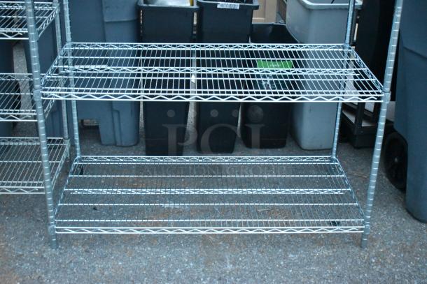 Chrome finish 5-tier wire shelving unit. Durable, spacious. Buyer must dismantle. Consider freight charges.