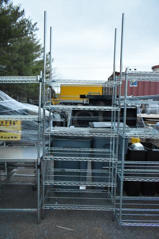 Chrome finish 6-tier wire shelving unit, outdoor setting. Buyer must dismantle; consider freight charges for shipping.