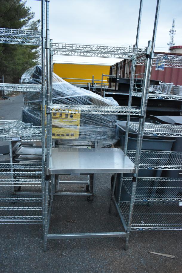 Chrome finish 3-tier wire shelving unit, outdoor setting, dismantling required, freight charges apply.