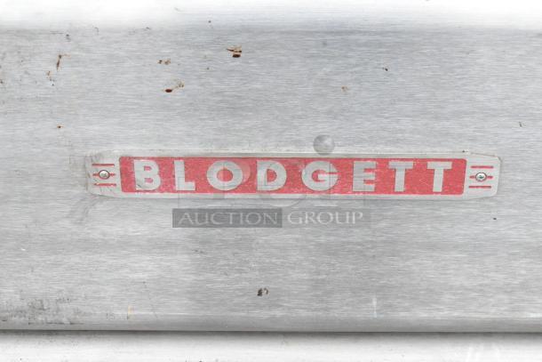 Blodgett 1060B stainless steel single deck pizza oven, commercial propane gas, 85,000 BTU. Red Blodgett logo on front.