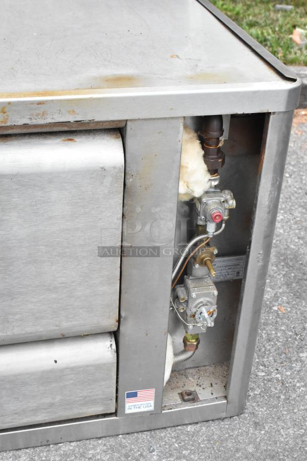 Blodgett 1060B stainless steel commercial single deck pizza oven, propane gas powered, 85,000 BTU, visible wear.