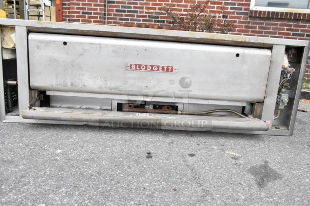 Blodgett 1060B stainless steel commercial propane gas pizza oven, single deck, 85,000 BTU, visible wear, Blodgett logo.
