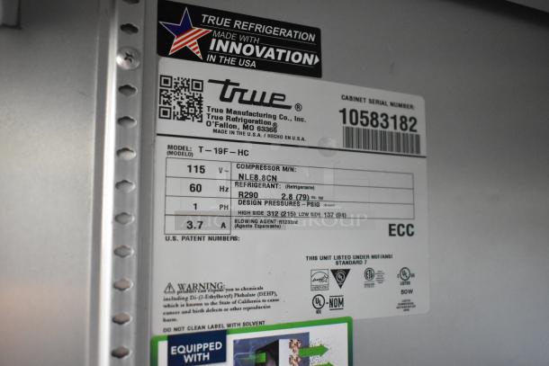 2022 True T-19F-HC Stainless Steel Freezer label, 115V, 1 phase, showing model, refrigerant details, and certifications.