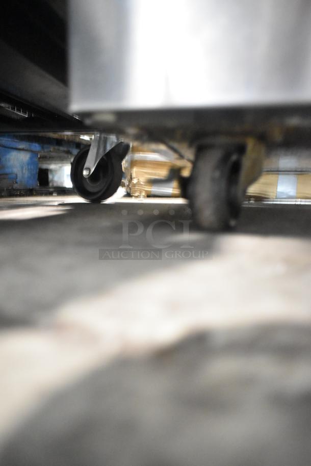 2021 Delfield 406P-STAR2 stainless steel undercounter cooler on commercial casters, 115V, single phase system.