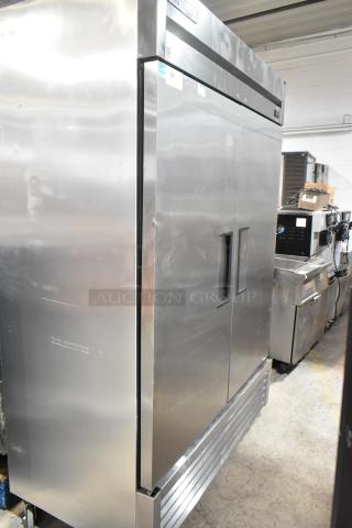 2020 True T-49F-HC Stainless Steel Commercial 2 Door Reach In Freezer w/ Poly Coated Racks on Commercial Casters. 115 Volts, 1 Phase. - Item #1222037