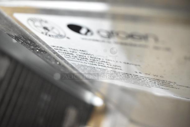 Groen TDH-48C stainless steel steam kettle label. Natural gas, 52,000 BTU. Model and serial numbers visible.