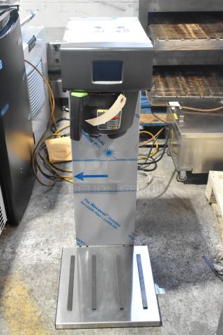 Brand new 2023 Fetco TBS-2121 stainless steel commercial iced tea brewer, 120V, 1 phase, with scratch and dent.