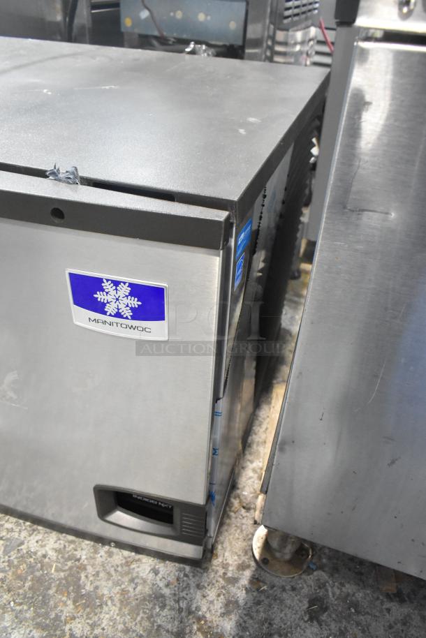 Brand new 2023 Manitowoc IYT0750A-261 stainless steel ice machine, 715 lb. capacity, 208-230V, 1 phase; slight dents visible.