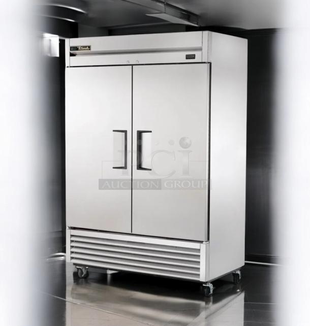 True T-49F-HC 2-door commercial freezer in outstanding condition, 115V, fully tested. Silver finish, visible True logo.