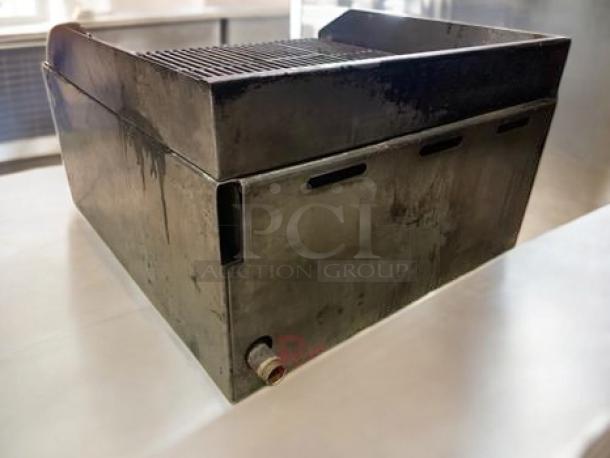 Commercial stainless steel countertop gas charbroiler, heavy-duty build, fully tested and working, used in great condition.