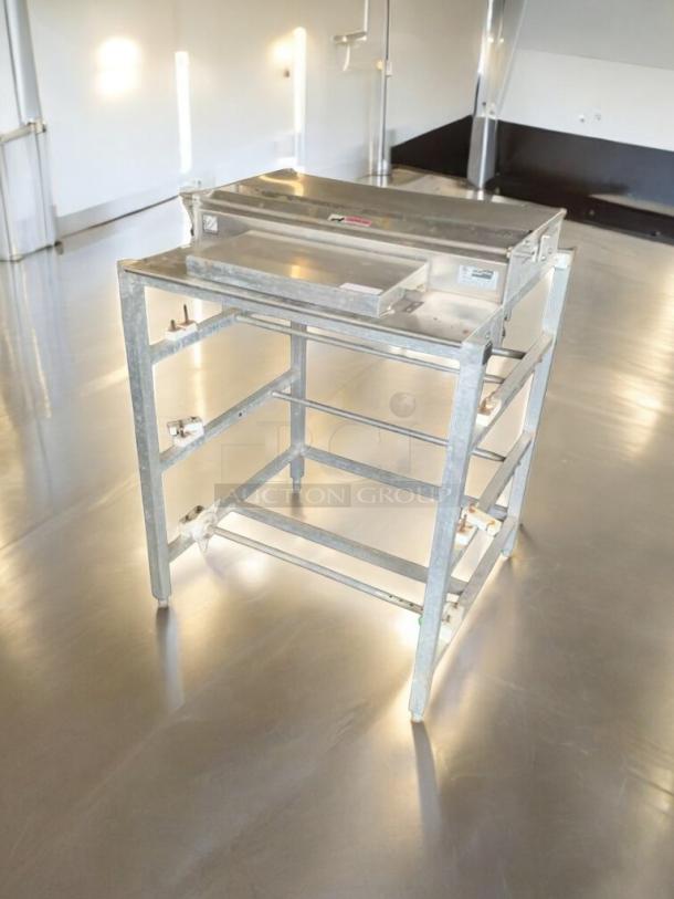 Heat Seal 104A24 industrial heat sealer in exceptional condition; 115V, fully tested and working, metallic frame, visible model label.