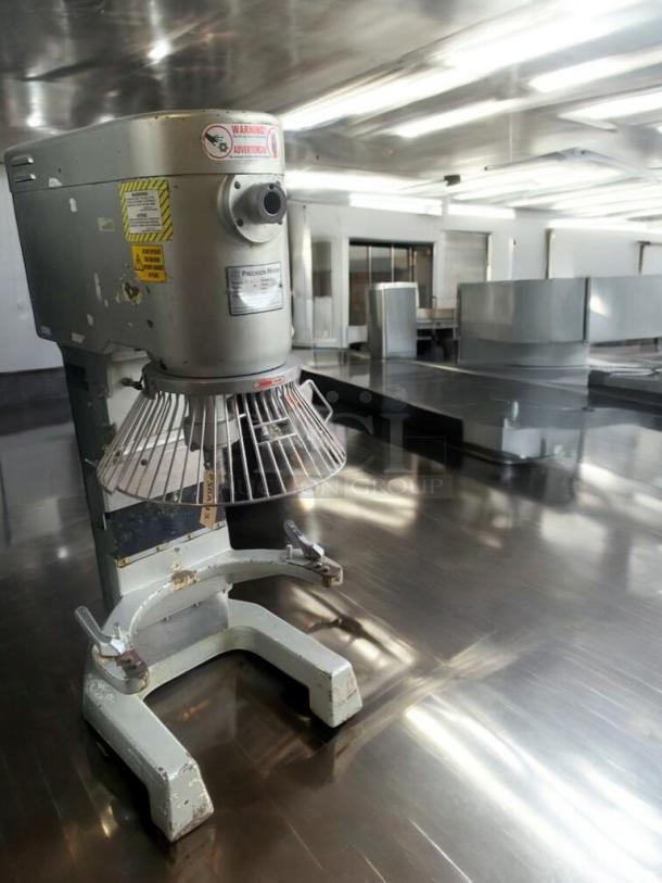 Precision Mixers HD-60, 60-quart commercial dough mixer in outstanding condition. Features safety labels and 220V power.