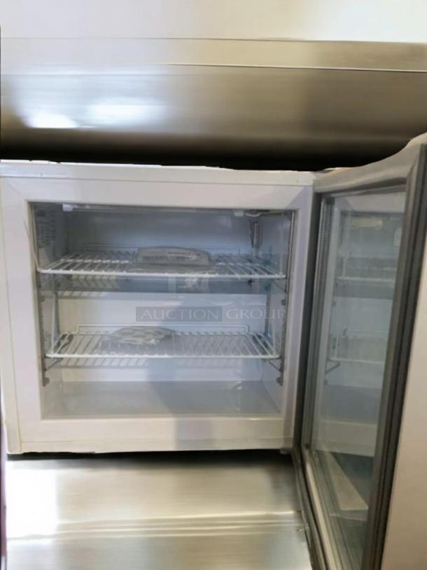 Maxx Cold MXM1-2F countertop freezer, prime condition, 115V, fully tested, visible shelves, and glass door.