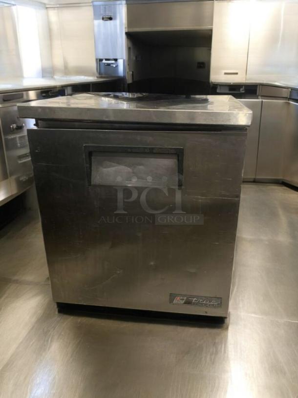 TRUE TWT-27 undercounter refrigerator, stainless steel, prime condition, fully tested, 115V, manufacturer label visible.