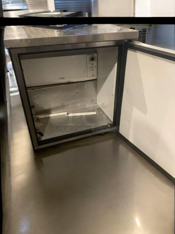 TRUE TWT-27 undercounter refrigerator, stainless steel, open door, prime condition, fully tested, 115V, by TRUE Manufacturing.
