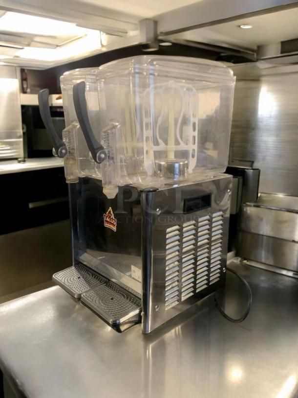 COMAI LYJ/LYP12LX2 cold drink dispenser in immaculate condition, fully tested, 110–130V, dual spouts, stainless steel finish.