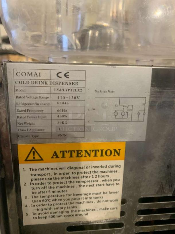 COMAI LYJ/LYP12LX2 cold drink dispenser in immaculate condition, 110-130V, fully tested, with safety instructions label visible.