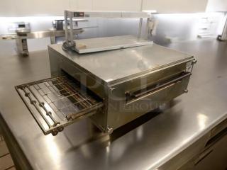 Prime condition XLT Conveyor Pizza Oven, model 3255, natural gas, stainless steel. Fully tested, excellent working order.