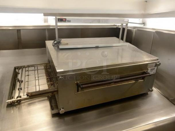 Prime condition XLT Ovens 3255 series conveyor pizza oven, natural gas, fully tested, stainless steel exterior, excellent working order.