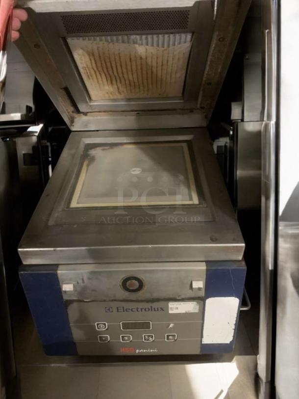 Electrolux Professional HSPPME panini grill, open lid, excellent condition, 208V, control panel, branding visible.