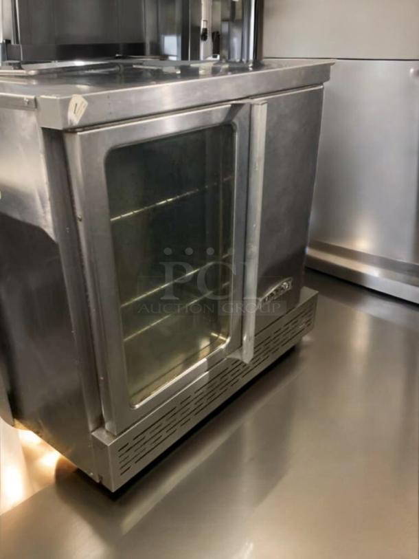 Imperial Gas Convection Oven, prime condition, fully tested. Features glass door, metal construction, standard model.