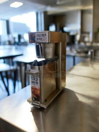 Newco CLDBR-3.5G commercial cold brew dispenser, stainless steel, 120V, prime condition, fully tested, "COLD BREW" label visible.