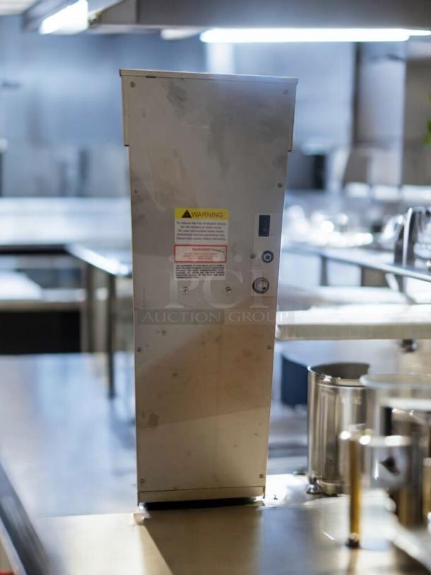 Newco CLDBR-3.5G commercial cold brew dispenser in prime condition, 120V, with safety warnings, fully tested and working.