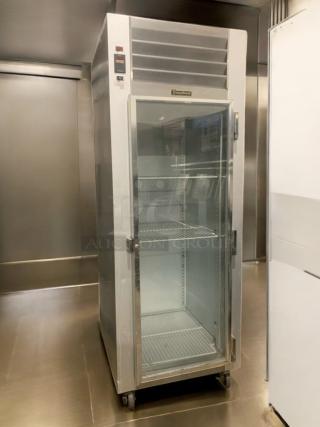 Traulsen G11010 commercial glass door refrigerator, 115V, prime condition, fully tested and working, with adjustable shelves.