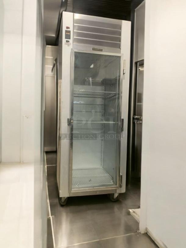 Traulsen G11010 commercial glass door refrigerator, excellent condition, fully tested, 115V, with brand logo visible.