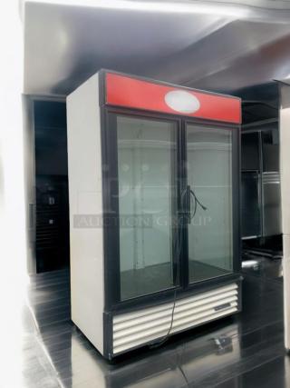 Prime condition True GDM-49 double glass door merchandiser refrigerator, 115V, fully tested. Black trim, white exterior.