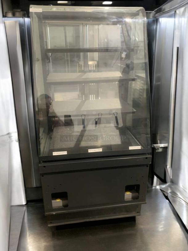 Heated merchandiser display case, commercial grade, superior condition, fully tested, glass front, multi-shelf, black finish.