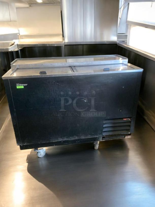 Turbo Air TBC-50SB-N6 bottle cooler in top-tier condition, black finish, tested and working, 115V, with sliding lids.