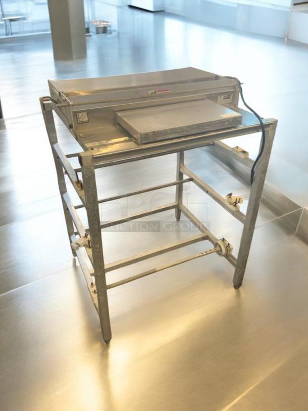 Premium Heat Seal 104A24 tabletop shrink wrap machine, fully tested, 115V, excellent condition, metal frame, USA-made.