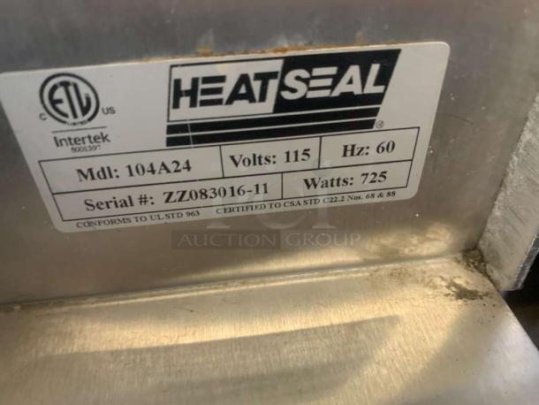 Heat Seal 104A24 tabletop shrink wrap machine, 115V, 725W. Premium condition, fully tested. ETL Intertek label shown.