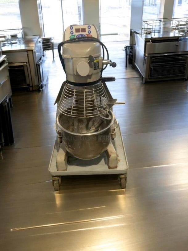 Globe SP20 20 Qt commercial planetary mixer in exceptional condition, fully tested. Includes safety guard and control panel.