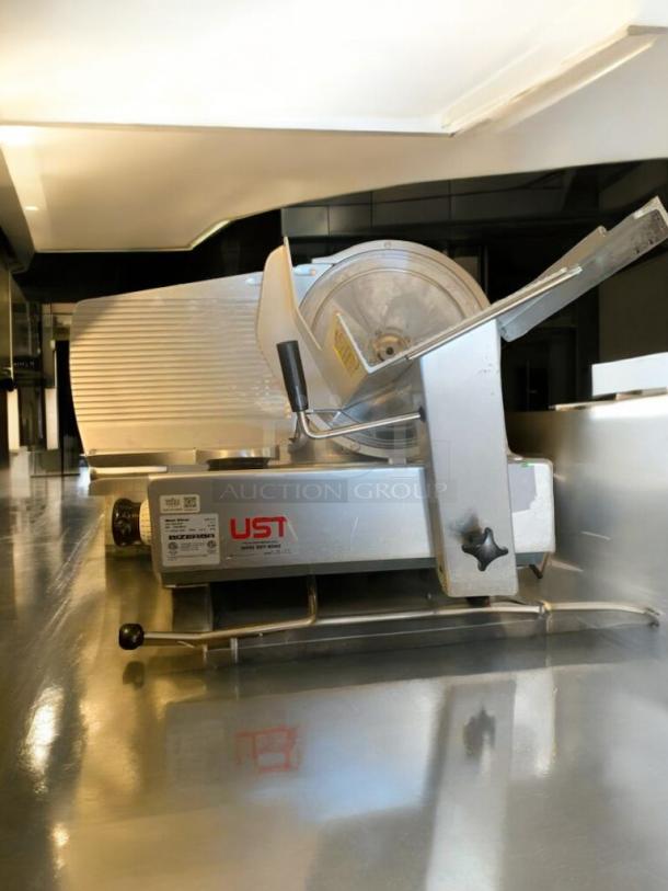 Pristine Bizerba GSP HD heavy-duty meat slicer, model T-11, 120V, fully tested, with service tags, in excellent condition.